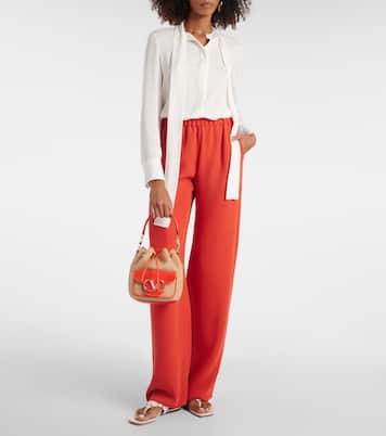 Locò Small raffia-effect bucket bag | Valentino Garavani