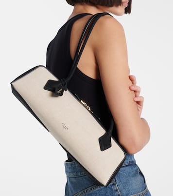 Le Teckel Small suede-trimmed shoulder bag | Alaïa