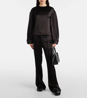 Pantaloni flared in raso a vita media | JW Anderson