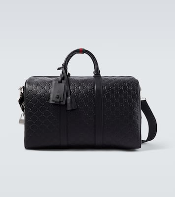 GG Emblem Medium leather duffel bag | Gucci