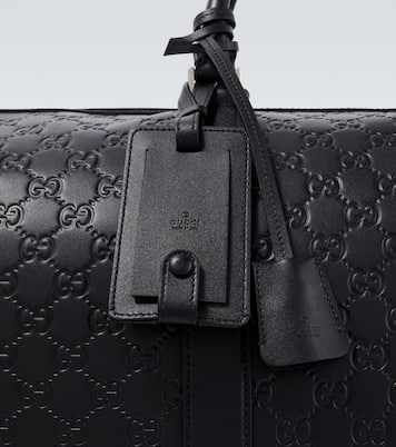 GG Emblem Medium leather duffel bag | Gucci