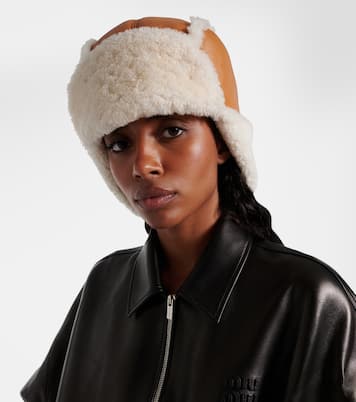 Shearling-trimmed leather hat | Miu Miu