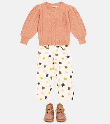 Pullover a trecce | The New Society