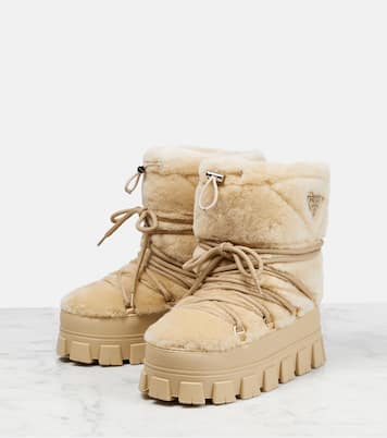 Shearling and leather snow boots | Prada