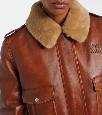 Shearling-trimmed leather jacket | Miu Miu