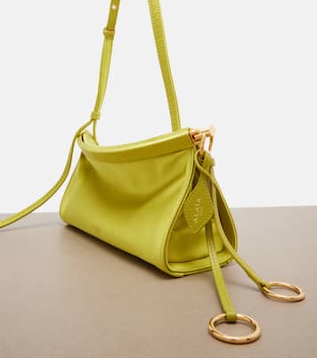 Le Click East West Small leather-trimmed satin shoulder bag | Alaïa