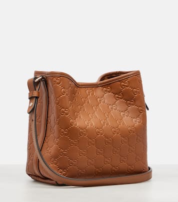 GG Emblem Small leather bucket bag | Gucci