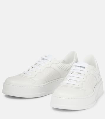 Baskets GG en cuir embossé | Gucci