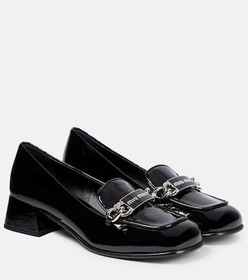 Mocassins en cuir verni à logo | Miu Miu