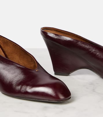 Mules compensées Colt 75 en cuir | Khaite