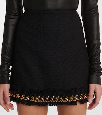 Minifalda de tweed adornada con cadenas | Versace