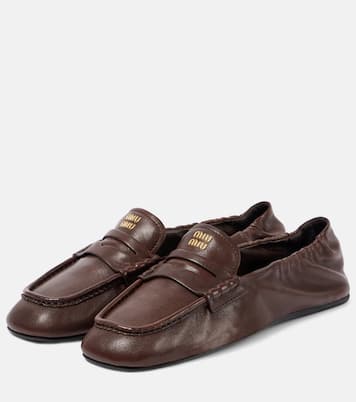 Logo leather penny loafers | Miu Miu