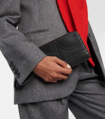 Pochette in pelle con monogramma | Toteme