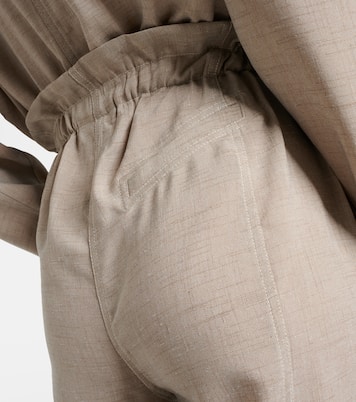 Pantaloni a gamba larga e vita alta | Ganni