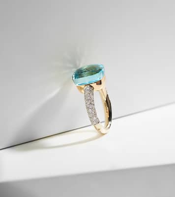 Anello Nudo in oro 18 kt con topazio e diamanti | Pomellato