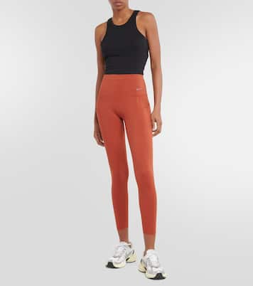 Leggings Universa de tiro alto en naranja Nike Mytheresa