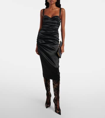 KM  100 lace-trimmed leather knee-high boots | Christian Louboutin