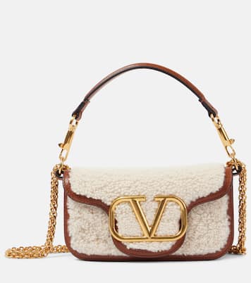 Locò Small shearling and leather shoulder bag | Valentino Garavani