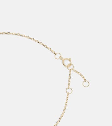 Tiny Emerald Goddess 14kt gold bracelet with emerald and diamonds | Stone and Strand