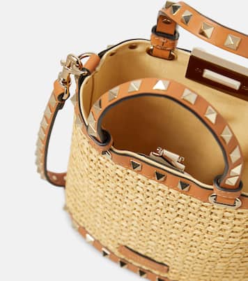 Rockstud Mini raffia-effect bucket bag  | Valentino Garavani