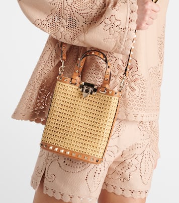 Rockstud Mini raffia-effect bucket bag  | Valentino Garavani