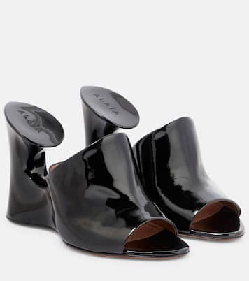 Mules Sculpture en cuir verni | Alaïa