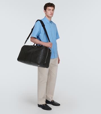 GG embossed leather duffle bag | Gucci