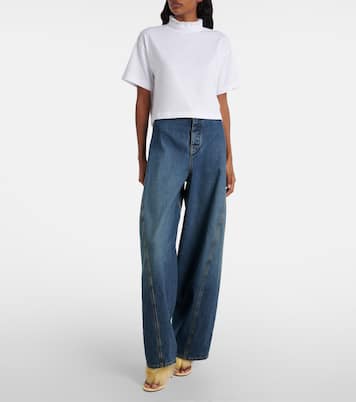 Shearling and leather thong sandals | Alaïa