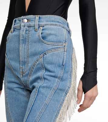 Spiral tassel-trimmed skinny jeans | Mugler