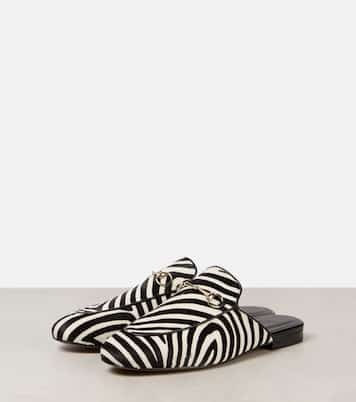 Mules in cavallino con stampa zebrata | Gucci