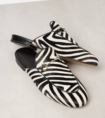Mules in cavallino con stampa zebrata | Gucci