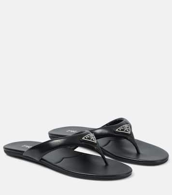 Logo padded leather thong sandals in black Prada Mytheresa