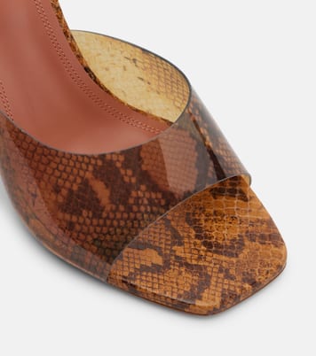 Lupita snake-print PVC mules | Amina Muaddi