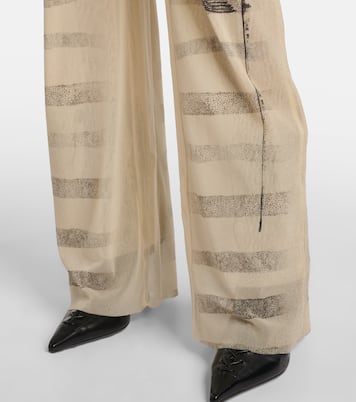Trompe l’oeil mesh flared pants | Jean Paul Gaultier