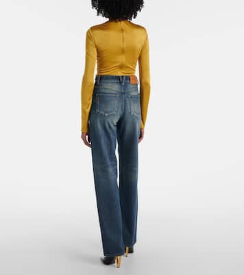 Jeans anchos de tiro alto con efecto desgastado | Versace