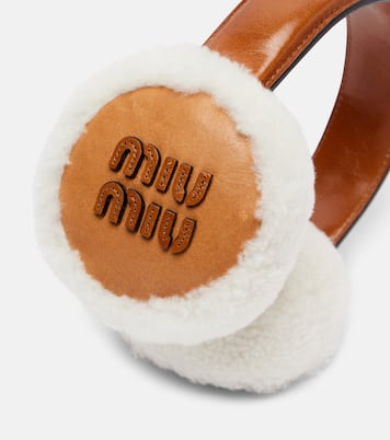 Shearling-trimmed leather earmuffs | Miu Miu