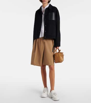 حذاء سنيكرز  مقلّم بالجلد Viv' On The Run | Roger Vivier