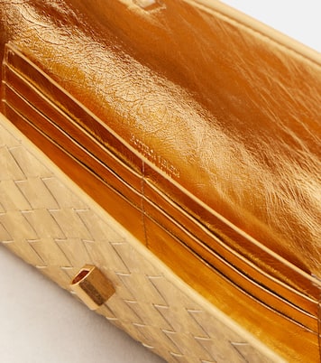 Andiamo Intrecciato metallic leather clutch | Bottega Veneta