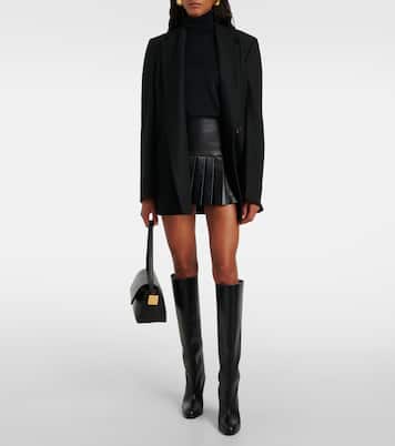 Pleated faux leather miniskirt | Norma Kamali