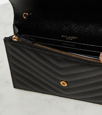 Clutch Envelope Cassandre in pelle con tracolla | Saint Laurent