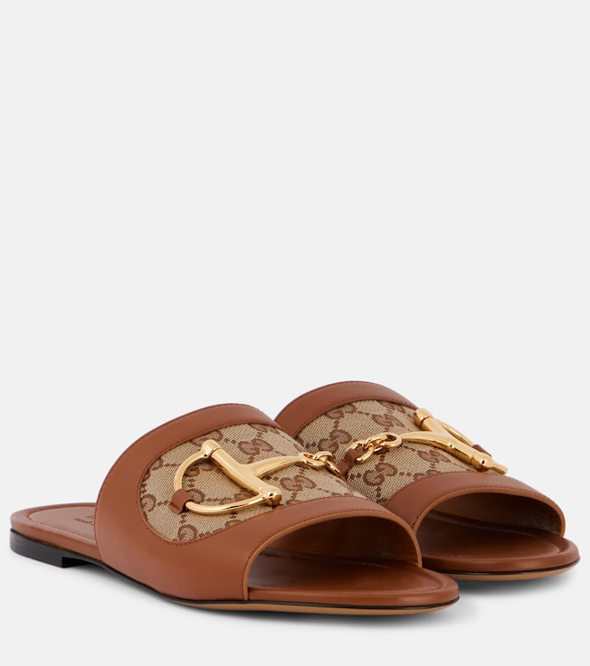 Horsebit GG canvas-trimmed leather slides | Gucci