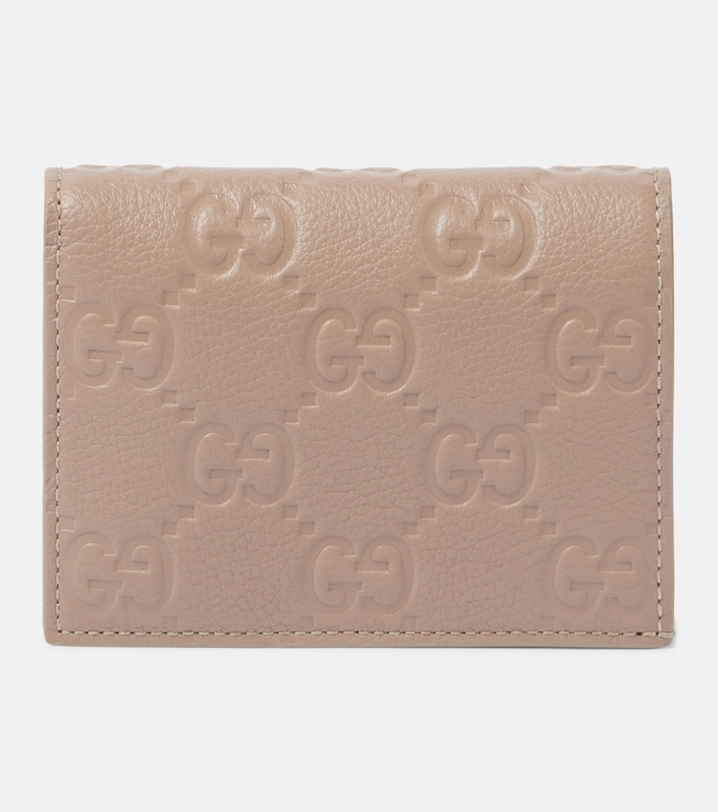 GG Mini debossed leather wallet | Gucci